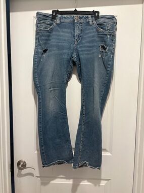 Silver Jeans Women's Faded Blue Distressed Wide Leg Jeans